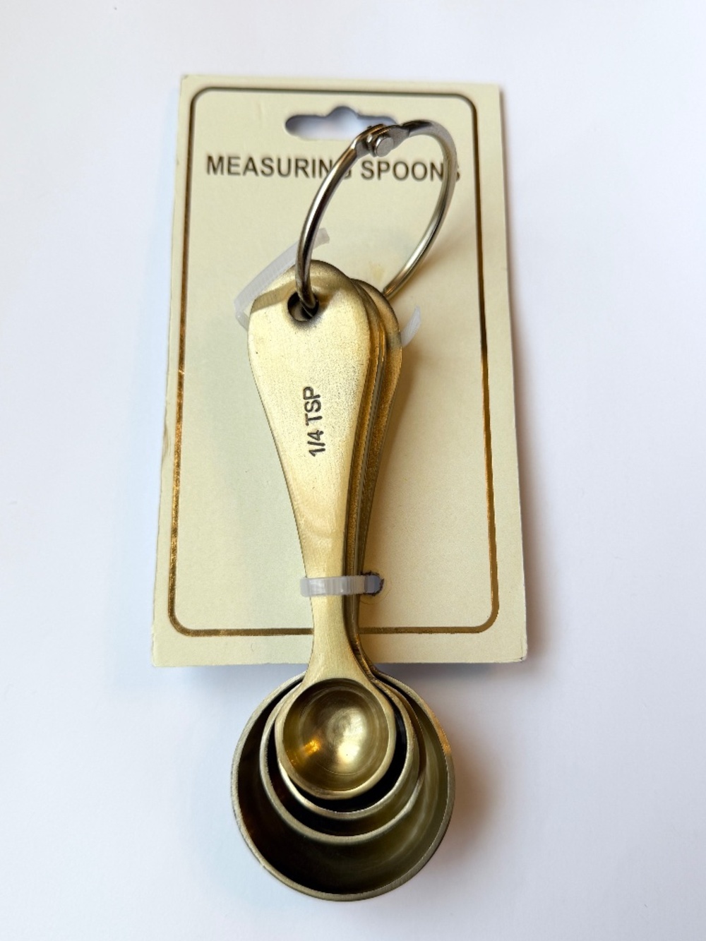 Set of 4 brass measuring spoons